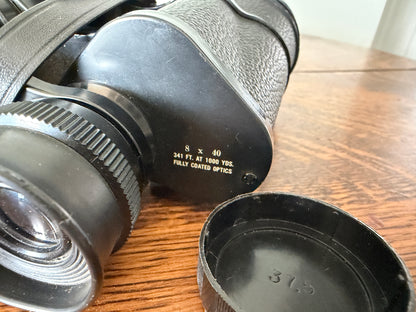 Vintage Bushnell Ensign 8x40 binoculars featuring Insta-Focus adjustment and fully coated optics.