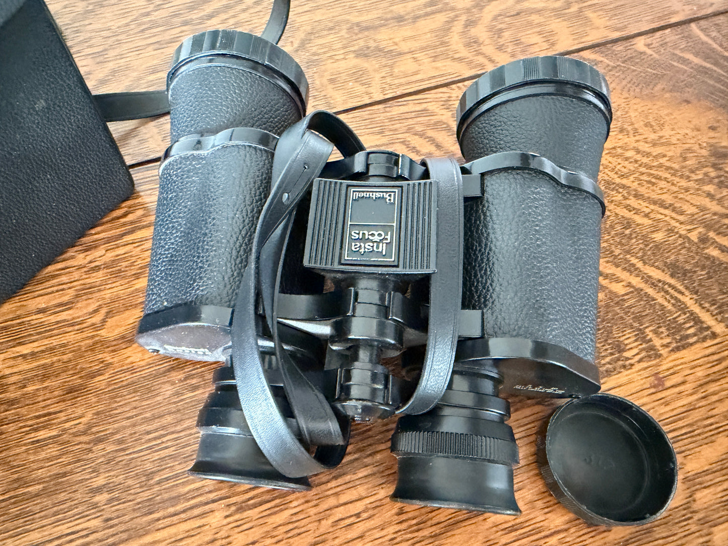Vintage Bushnell Ensign 8x40 binoculars featuring Insta-Focus adjustment and fully coated optics.